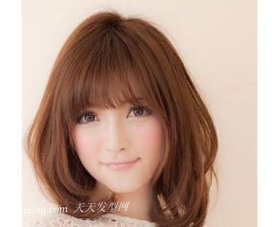 长脸女生适合的发型 时尚小脸卷发 zaoxingkong.com